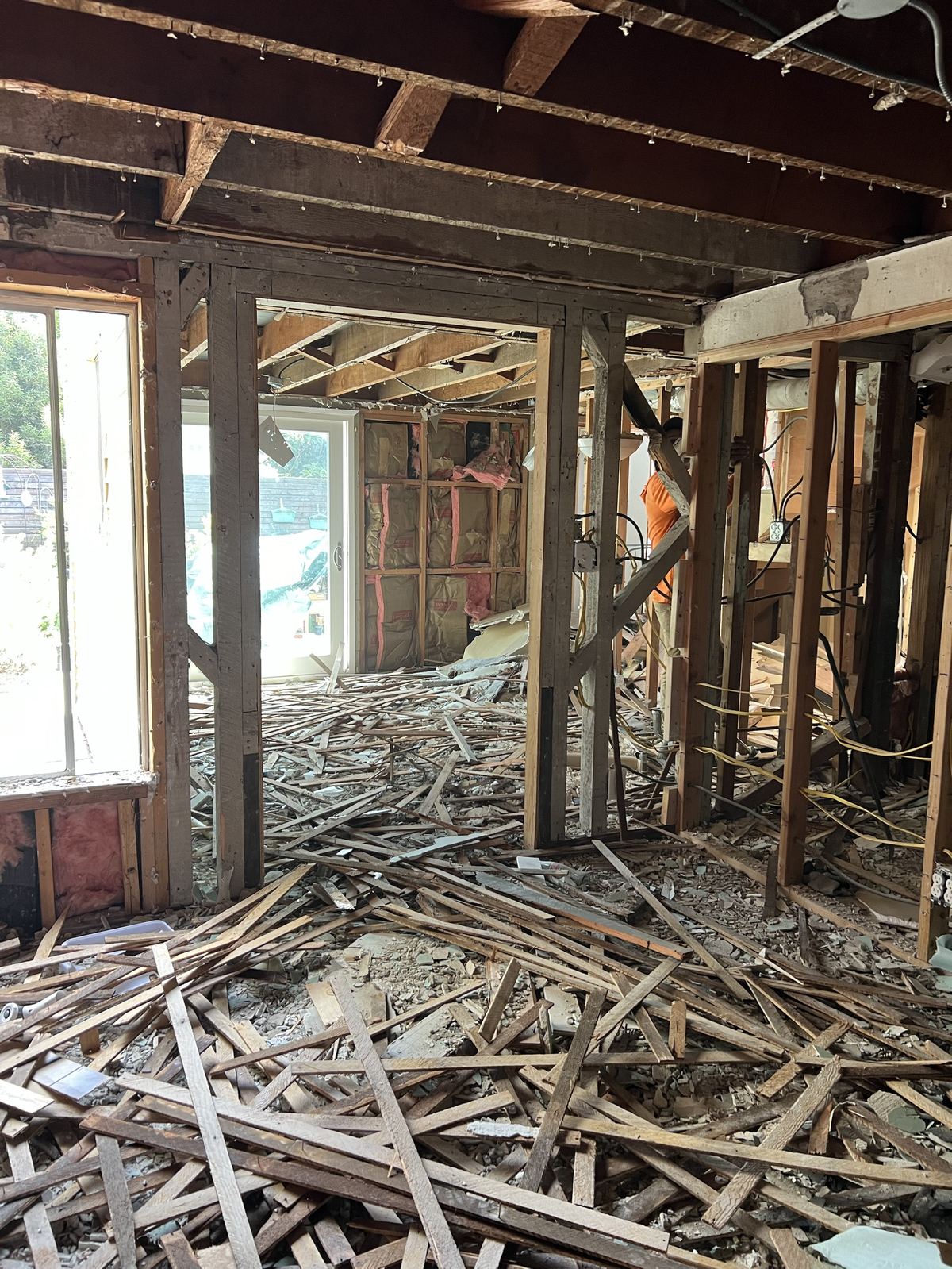 Central Richmond home interior gutted to framing, ready for structural work